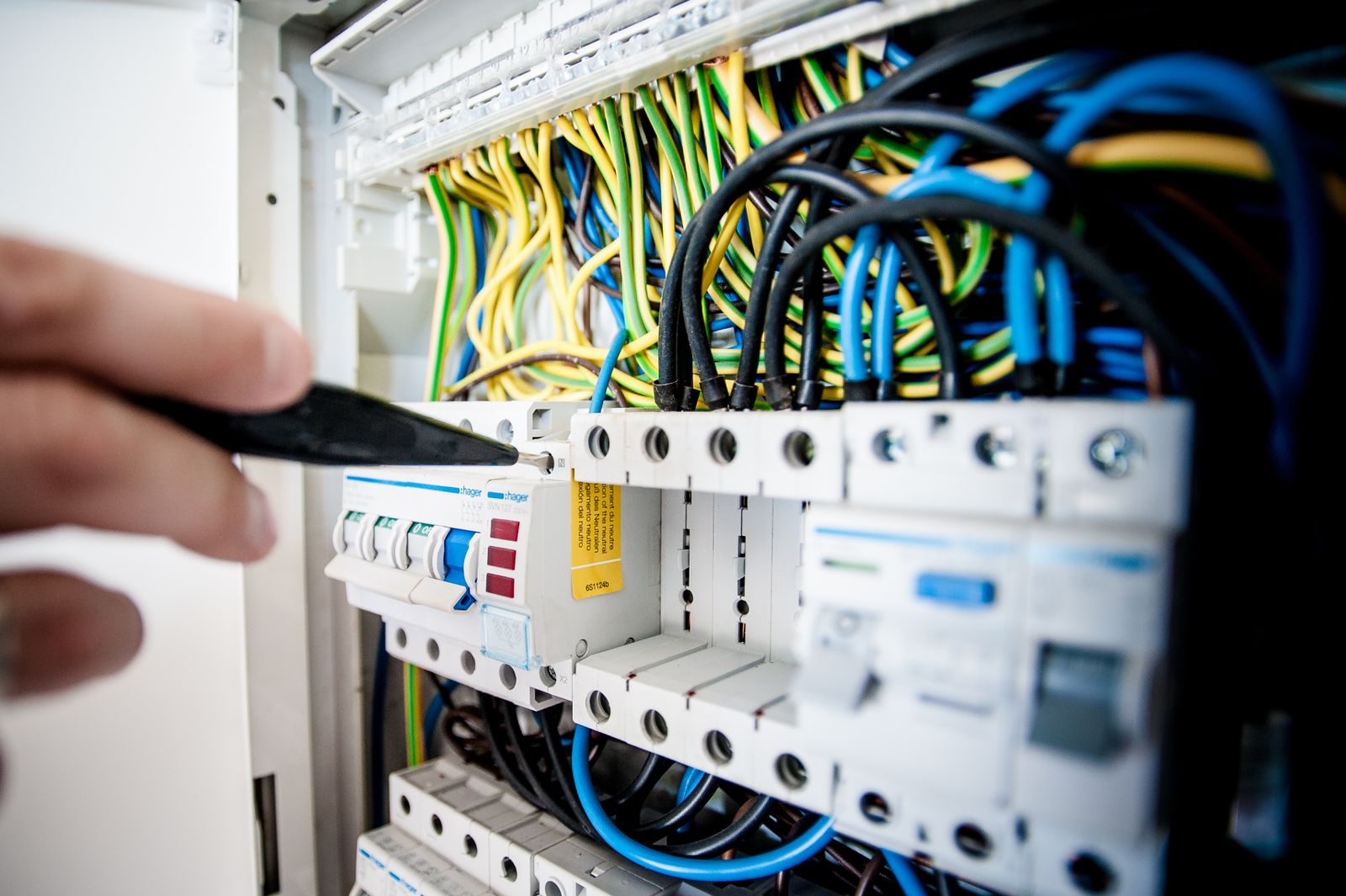 Close-up of electrical installation work on a distribution board